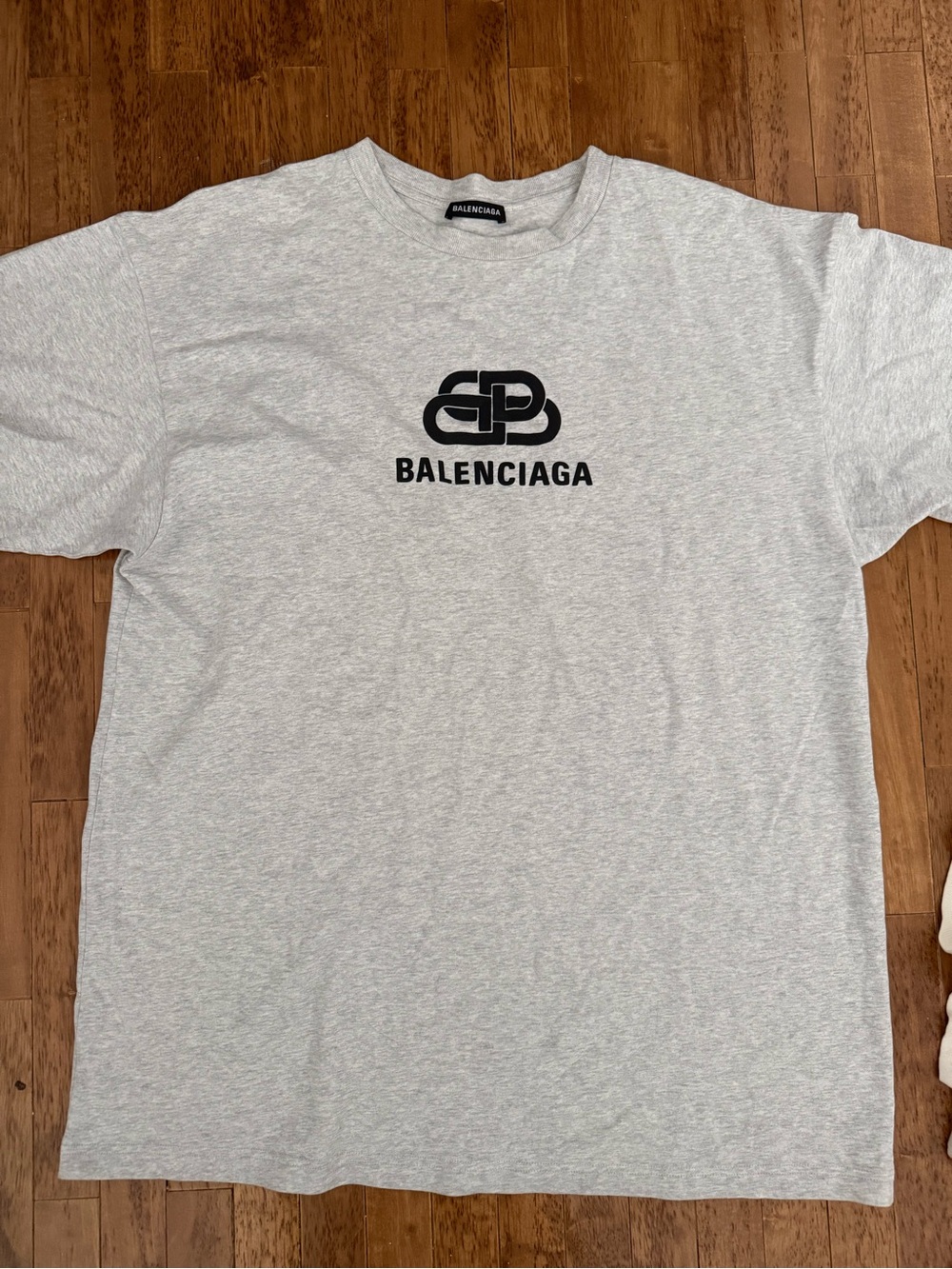 Balenciaga Light Gray Short Sleeve Logo Tee with Black Emblem